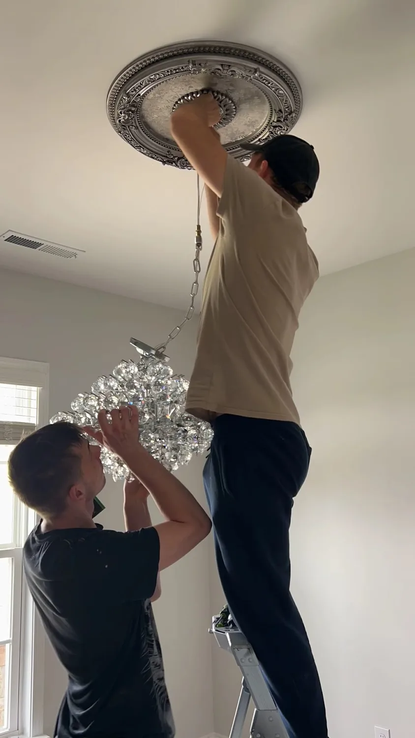 Chandelier and light fixture installation in Charlotte NC by Dmitrii Handyman Service