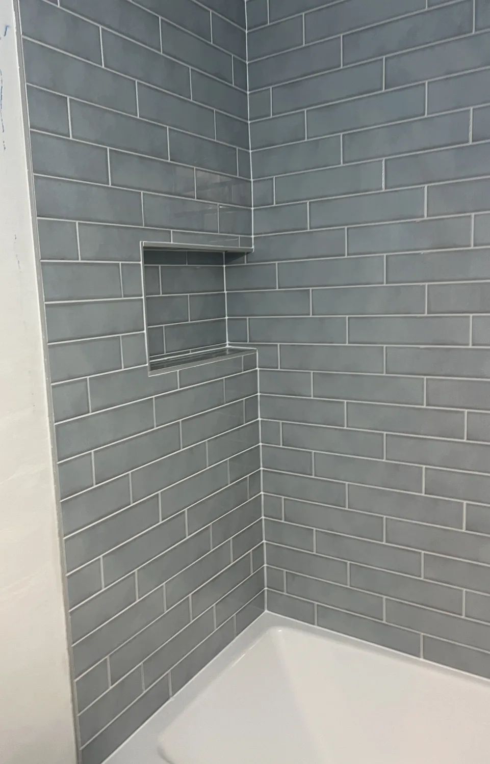 Subway tile shower niche detail in Charlotte NC